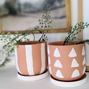 Two painted terracotta planter